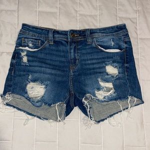 Ripped jean shorts in excellent condition Size 27